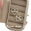 Pendientes de Plata de Ley S925 con Diseño Ins de Lujo Accesible Coreano, Corazón Hueco y Perlas Cosidas, para Mujer con Sentido de Alta Gama