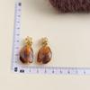 Pendientes vintage marrones estilo Maillard, pendientes de viñeta irregular con temperamento estilo Hong Kong, pendientes de moda francesa de gran sentido.