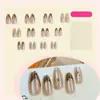 Unhas Postiças Francesas Populares Transfronteiriças de Amêndoa Dourada com 24 Peças, Unhas Manicure de Luxo Acessível Olho de Gato de Alta Qualidade