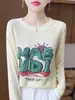 Nueva camiseta de punto casual de otoño para mujer con estampado de letras de dibujos animados, manga larga, cuello redondo, corte holgado, top fino y adelgazante