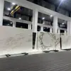 Fabricante mayorista de losas de mármol Yunfu, procesamiento, corte de paredes de fondo blanco Fendi y fabricación a medida de mesas de centro y mesas de comedor para proyectos de construcción