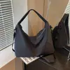 Bolsa feminina transfronteiriça de grande capacidade 2026 nova bolsa tote versátil bolsa de ombro casual bolsa para o dia a dia bolsa de bolinho