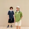 [Procesamiento Personalizado] Camisa Polo Ropa de Trabajo, Holgada y Moderna, Bloques de Color, Manga Corta Rayada para Hombre con Cuello Campana