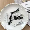 Estilo Coreano Simples Clipe de Pato de Metal Sem Costura 2025 Novo Presilha de Cabelo com Linha Preta e Branca Versátil para Franja Lateral Acessórios de Cabelo para Mulheres