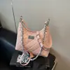 Bolso pequeño acolchado con cadena versátil de primavera-verano transfronterizo para mujer, nuevo modelo 2026, bolso tipo albóndiga para debajo del brazo, bolso cruzado elegante y con estilo