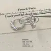 Aretes de clip para oreja de varilla de cobre doblada ecológica de cuerpo completo, elegantes, simples, con baño blanco, incrustaciones de circonita, aretes de dos colores, perforación de agujeros en la oreja, joyería para la oreja, aro para la oreja