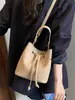 Bolso tipo cubo retro con cordón para mujer, nuevo estilo 2026, moderno y versátil, con un toque de alta gama, adecuado para llevar al hombro o cruzado, y se puede llevar debajo del brazo para un look casual