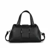 Bolsas de mano de comercio exterior para mujer 2026 nuevos modelos elegantes para madres de mediana edad, populares bolsos de hombro y bolsos de mano para mujer con relieve