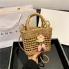 Nova Bolsa de Palha Vazada 2024 Mini Bolsa Fofa Bolsa Tecida Explosiva Feita à Mão Bolsa de Praia Fresca para Mulheres