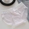 Borda de orelha de madeira calcinha feminina laço oco jacquard calcinha de menina 10A antibacteriana entrepernas estendido estudante