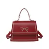 Moda de Verão 2025 Nova Bolsa de Mão de Grande Capacidade Textura Simples Casual Tendência Bolsa Transversal de Ombro com Laço