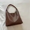 Bolso de hombro casual retro simple, bolso tote tejido nuevo de gran capacidad, bolso de moda de alta calidad para madre e hija que van al trabajo.