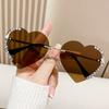 Nuevas gafas de sol de estilo europeo y americano con incrustaciones de diamantes, sin marco de metal, con borde de corazón de melocotón, modernas y novedosas gafas de amor.