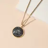 Collar Colgante de Vidrio Medalla Siete Ángeles Transfronterizo Europeo y Americano, No se Desvanece, No se Oxida, Moderno Collar Luminoso de Acero de Titanio