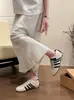 Zapatillas de entrenamiento cómodas de suela blanda con velcro retro para mujer, nuevas zapatillas casuales ligeras adelgazantes de verano 2026, zapatillas Forrest Gump