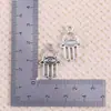 Venta Caliente Transfronteriza Plata Antigua Hamsa Mano de Fátima Símbolo Colgante Joyería Accesorios Collar Arete Materiales