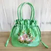Nuevo 2026 Estilo Étnico Retro Bolsa de Tela Bordada Bolso Cubo Cierre de Cordón Bolsa para Teléfono Móvil Bolsa de Almacenamiento Bolso de Mano Hecho a Mano para Mujer