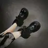 Jiezhou Colección Otoño 2026: Botas Martin de Cuero Lavado Vintage para Mujer con Acabado Texturizado, Diseño que Aumenta la Altura y Estiliza