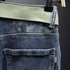 Jeans Elásticos Estilo Otoño e Invierno para Hombre Estilo Coreano Moderno Juventud Corte Delgado Pierna Pequeña Favorecedor Pueblo de Xintang Guangzhou Pantalones Largos Versátiles