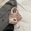 Bolsa de Bolos de Gama Alta para Mujer Nueva Colección Primavera 2026 Bolso de Mano Versátil de Nicho Bolso Cruzado Mini Versátil