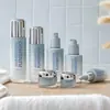Conjunto de cosméticos: Frasco de sérum de 120ml, frasco de spray hidratante de 80ml e pote de creme hidratante acrílico de 50ml