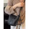 Moda Personalizada 2026 Nuevo Diseño Bolso Cubo Retro Simple de Gama Alta Versátil Bolso Cruzado de Hombro para Mujer