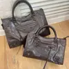 2026 Nuevo Modelo Le City Remache Bolso de Motocicleta Bolso de Mano de Cuero Genuino para Mujer Bolso de Hombro Cruzado de Moda Transfronterizo