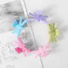 Nuevo pasador de plástico pequeño de cruz estilo coreano forma X clip para baño ducha pinza de cangrejo Venta directa de fábrica de joyería de Guangzhou