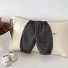 Pantalones Casuales de Color Sólido Versátiles y de Moda Estilo Coreano 2026 Primavera y Otoño Más Vendidos con Bolsillos para Niños y Niñas
