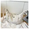 Otoño e Invierno Nuevo Aspecto Elevado Coreano Ins Retro Fresco Color Puro Simple Bolso Dumpling Bolso Cruzado Ligero para Mujer