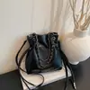 Bolso bandolera de moda con cordón, color liso, para mujer, nueva colección de primavera 2026, bolso de hombro simple y elegante en forma de cubo