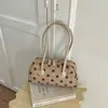 Bolso de axila de lunares dulce y lindo estilo coreano para mujer, perfecto para otoño, versátil, elegante y adecuado para uso casual y para ir al trabajo.; un bolso Boston de moda