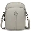 Bolsa de ombro feminina moderna e simples, bolsa nova de alta qualidade para celular, design de nicho requintado, bolsa transversal versátil