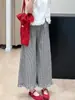 Conjunto de Duas Peças Verão 2026 Nova Moda Estilo Coreano Petite Emagrecedor Top Branco Sem Mangas e Calça de Perna Larga Xadrez
