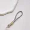Correa de Muñeca Trenzada Estilo Ins Lanyard Nudado Cuerda Corta de Silicona Colgante Antiperdida para Teléfono Dopamina