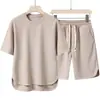 Traje nuevo de manga corta, camiseta de cuello redondo talla grande, de alta gama, color liso, manga corta, conjunto ligero y cómodo de dos piezas con pantalones cropped