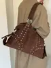 Bolso retro de nicho de gran capacidad para mujer, nuevo bolso de hombro de moda 2026 para ir al trabajo, bolso de mano de alta gama