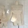 Top de puro deseo estilo francés sin hombros con aberturas laterales, puños de lazo y diseño ceñido a la cintura en color albaricoque de Yehong Clothing