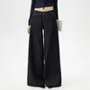 Pantalones de corte acampanado holgados de cintura baja, estilo retro americano 2026, con caída fluida, versátiles para otoño e invierno, con diseño de cintura irregular.