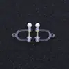 Suministro directo de fábrica accesorios para pendientes populares japoneses y coreanos resina de perla incrustada pendientes de primavera clip en forma de U material para pendientes diy