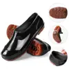 Botas de chuva isoladas, de cor sólida e com sola grossa, impermeáveis e duráveis, com revestimento resistente à água, adequadas para homens e ideais como sapatos de chef