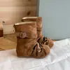 Botas de estilo vaquero occidentales para niñas con correas, botas de media pantorrilla, colección de otoño 2026, versión coreana, versátiles con hebilla de cinturón y lazo, botas Martin
