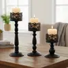 Personalizado da fábrica de origem, castiçal de metal preto transfronteiriço, porta-velas oco-esculpido em ferro para site independente da Amazon