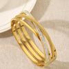 Europa e os Estados Unidos transfronteiriço hot hollow multi-layer cross diamante pulseira de aço de titânio 18K pulseira banhada a ouro meninas jóias desgaste