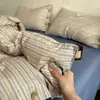 Juego de cuatro piezas de gasa de doble capa grado A, funda de edredón con botones, sábana plana y sábana bajera, algodón lavado liso, adecuado para dormitorios de estudiantes, juego de tres piezas