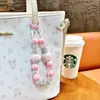 Cadena para teléfono de pompón con cuentas transfronteriza, llavero de bola de diamante para coche, colgante para mochila, regalo personalizado, venta al por mayor de comercio exterior