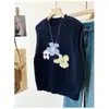 Chaleco de punto jacquard floral estilo universitario para mujer, adecuado para primavera y otoño, se puede usar sobre una camisa o como un chaleco suéter corto.