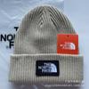 Venta al por mayor de fábrica de sombreros transfronterizos de otoño e invierno, sombrero de punto europeo y americano, suéter cálido para hombre, sombrero de lana, moda casual, protección para los oídos, sombrero frío