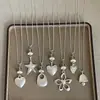 Estilo Minimalista Colgante de Corazón y Estrella Mate Collar Largo, Único y de Nicho, Apilable, Cadena para Suéter Fresca y Versátil