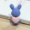 LLavero de conejo de lana tejido con dibujos animados de amor, bonito colgante para pareja, llavero creativo para coche, venta al por mayor